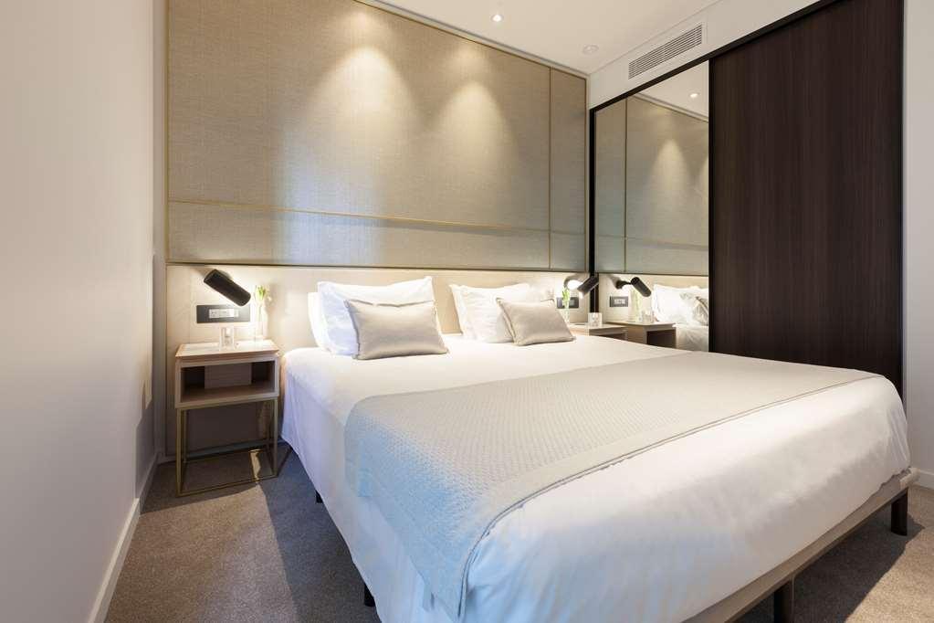 One Global Resorts Green Square Sydney Kamer foto A bedroom at the hotel