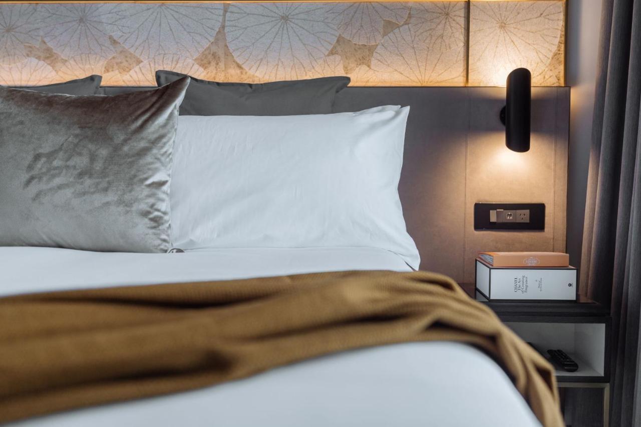 One Global Resorts Green Square Sydney Buitenkant foto A bedroom at the hotel