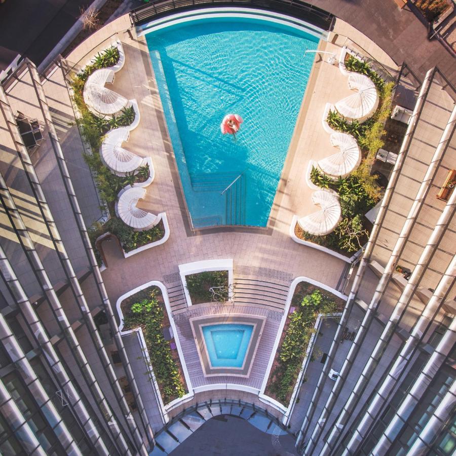 One Global Resorts Green Square Sydney Buitenkant foto The pool at the 1018